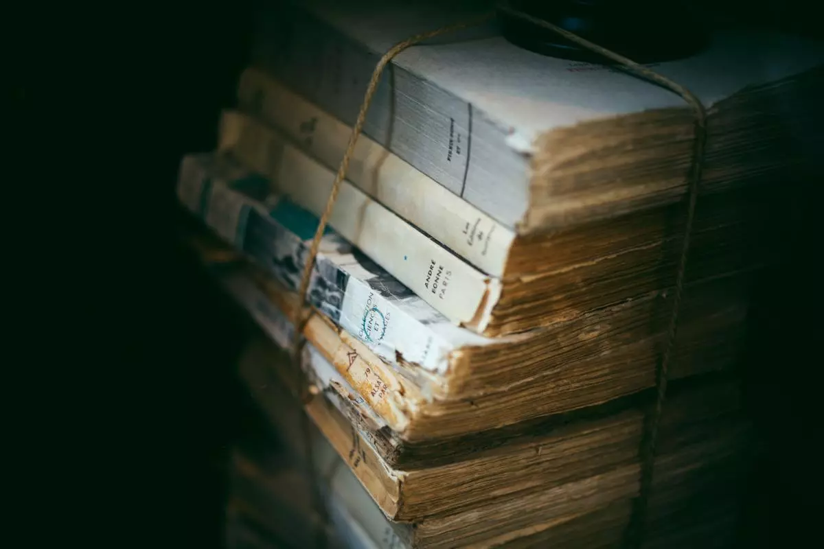 pile of books tied with string
